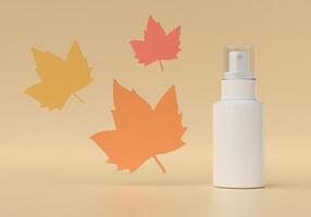 Spray tube for medicine or cosmetics on orange background and maple leaves. photo