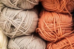 The texture of multi-colored fluffy woolen threads for knitting. photo