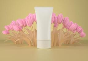 Squeeze tube for applying cream or cosmetics on a pastel orange background. photo