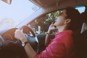 Asian women travel relax in the holiday. drive a car