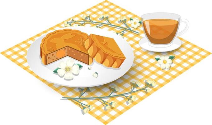 Salted egg yolk mooncake with teacup set on tablecloth