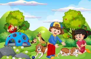 Park scene with children playing with their dogs vector