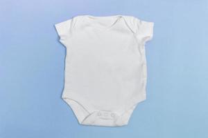 Baby body mockup, white on a colored background. Close up. photo