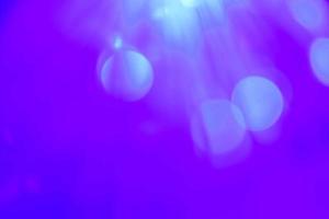 purple and blue neon light abstract Neon bright lens flare colored on black background.dark abstract futuristic background and Neon backgrounds photo