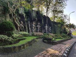 statue in the road landscape Nature park Mountain valley road landscape Colorful autumn landscape and Beauty of nature concept photo