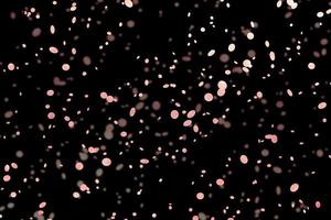 Efecto de luz con estilo abstracto de brillo rosa sobre un fondo negro y destellos de partículas de polvo mágicas brillantes sobre negro foto