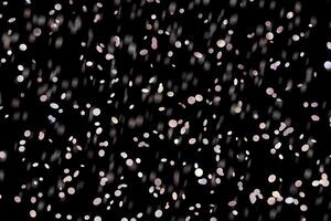 light sparkle Abstract stylish light effect on a black background and sparkles Sparkling magical dust particles on black photo