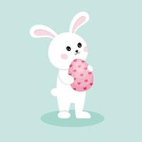 Rabbit with an Easter egg. A cute rabbit holds a pink Easter egg in its paws. Vector character for the Easter holiday.