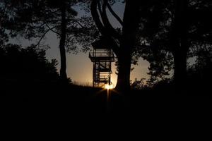 Silhouette of Nature Observation Tower in Sunset photo