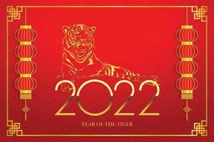 Golden tiger symbol on golden chinese pattern background Happy Chinese New Year 2022 Everything is going very smoothly and small Chinese wording translation Chinese calendar for the tiger of 2022