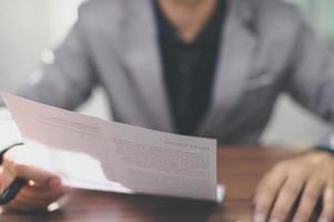 businessman reading documents income photo