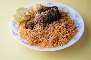 mutton biryani meal in a plate on table. photo