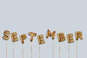 september written with foil gold balloons. september lettering with realistic gold balloons. september typography. isolated vector design. september background with copy space area