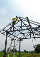 CHONBURI, THAILAND - Oct 12, 2016 Man working on house construction photo