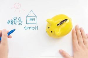 piggy Bank for money to buy a house concept photo