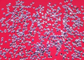 Texture. Spiders on a red background. The view from the top. photo