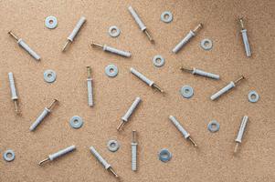 Repair. Screws and washers on the desktop. The concept of a repair shop. photo