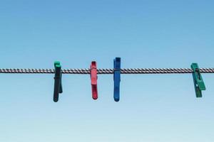 clothespins on a clothesline for drying clothes photo