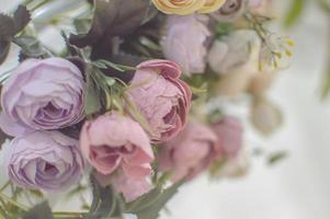 texture artificial roses on the wedding arch. decoration. background. selective focus photo