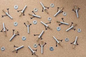 Repair. Self-tapping screws and washers with bitmap elements on the desktop. The concept of a repair shop. photo