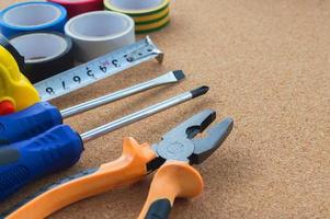 Men's work. The repair tools are on the table. The concept of housework, workshop. photo
