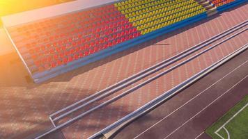 top view over the football field partially with a running track and seating photo