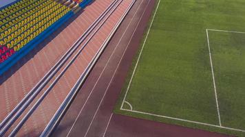 top view over the football field partially with a running track and seating photo