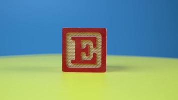Close up shot letter E alphabet wooden block video