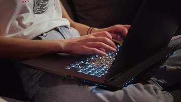 Close up woman hands working typing on keyboard laptop. video