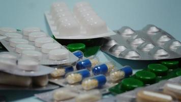 Blister pack pills on blue background