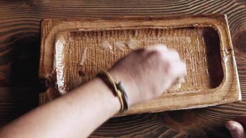 Applying oil for wood to a wooden oak board video