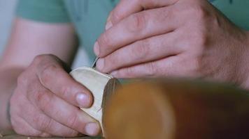 Woodcarver carves a robot video