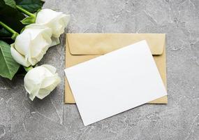 White roses and greeting card photo