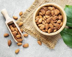 Almonds in brown bowl photo