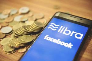 Libra coin blockchain concept New project libra a cryptocurrency launched by Facebook looks to mainstream digital currency through apps like , selective focus photo