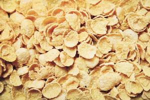 Cornflakes texture background top view - Breakfast cereal photo