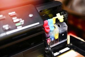printer ink tank for refill at office Close up printer cartridge inkjet of color black CMYK and repair fix the problem concept