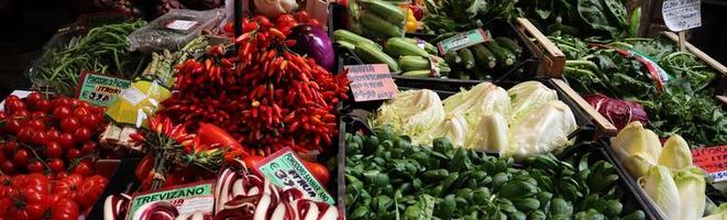 Market stall selling vegetables in Bologna. Italy photo