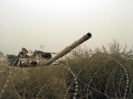 Military army vehicle tank on tracks with barrel after victorious war photo