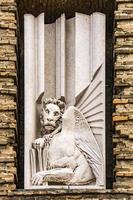 Lion, symbol of St Mark, on facade of Abbey of St Justina in Padua, Italy photo