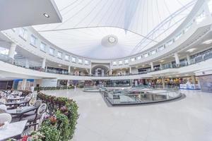DUBAI, UAE, 2014 - Interior of Deira City Center in Dubai. It is an 3 floor shopping mall, opened August 27, 1995.