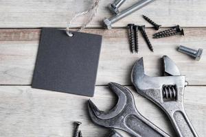 Happy father's day.  Old work tools on a gray wooden background photo