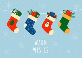 Christmas greeting card with colorful christmas socks. Christmas winter design element in doodle style. vector