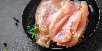 raw chicken breast slices poultry meat keto or paleo diet