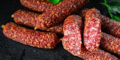 dry-cured sausages smoked sausage uncooked meat meal fast food snack photo