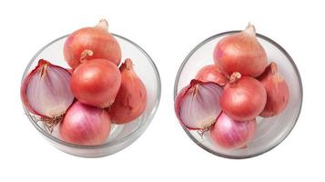 Shallots onion in glass cup on white background photo