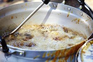 fry meat in palm oil in thailand photo