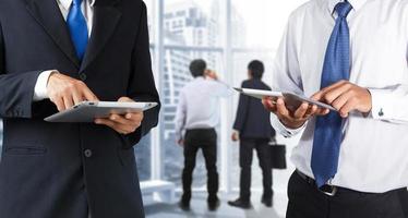 Businessman using tablet photo