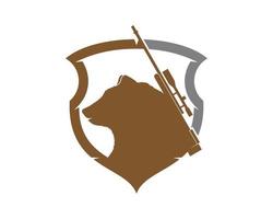 Bear hunter inside the shield protection logo vector
