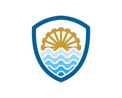 Shield with abstract wave and water mill inside vector